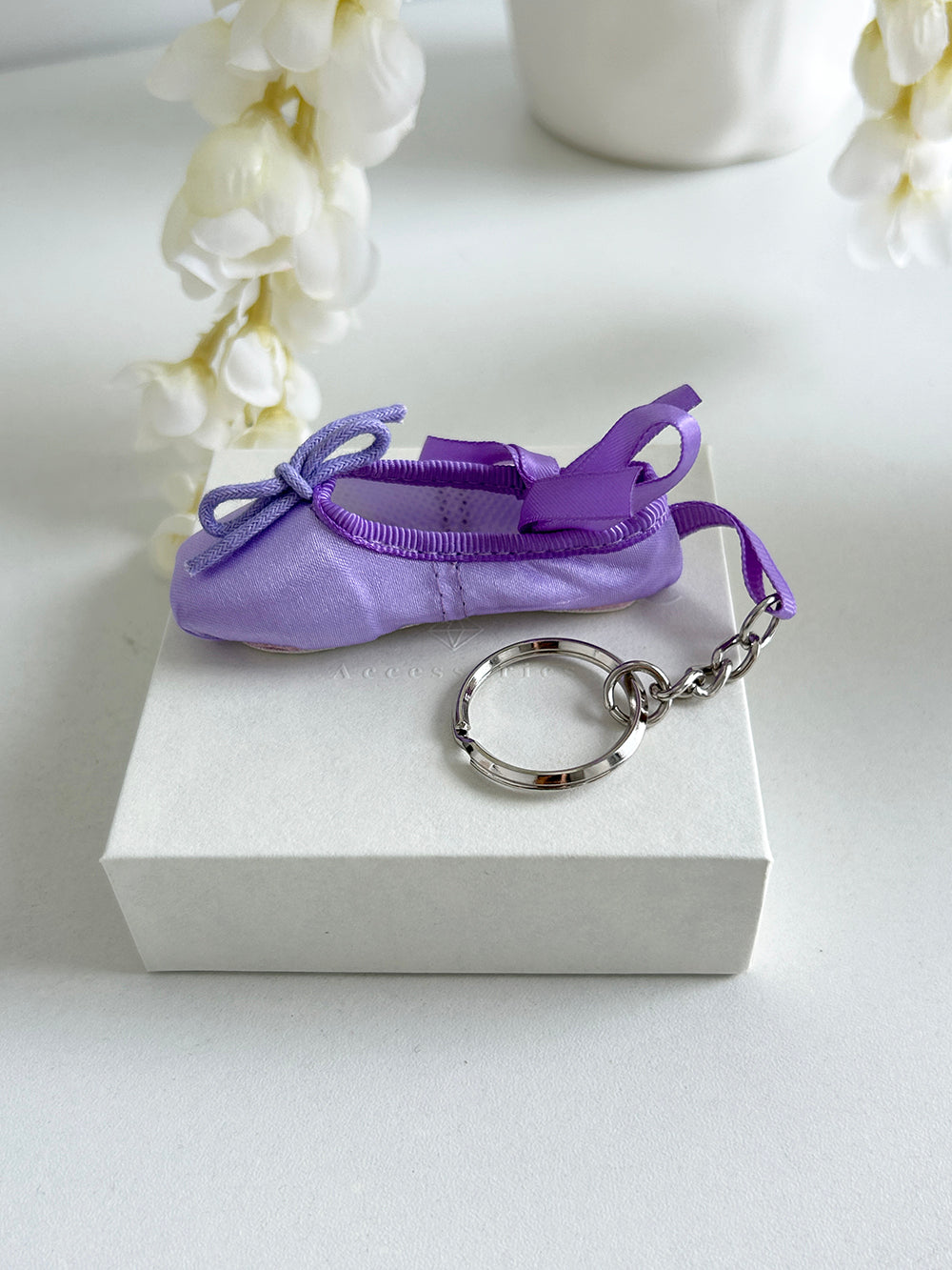 mini ballet slippers keychain.